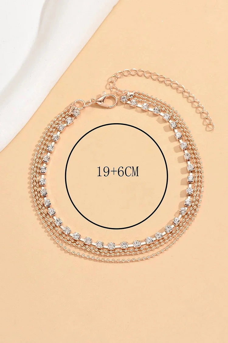 Cavigliera multistrato in lega alla moda con decorazioni in strass