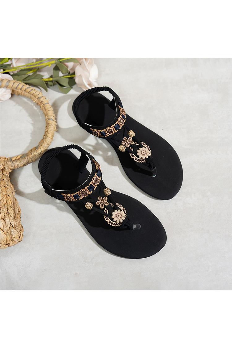 Sandali casual con punta tonda e decorazioni floreali in stile boho