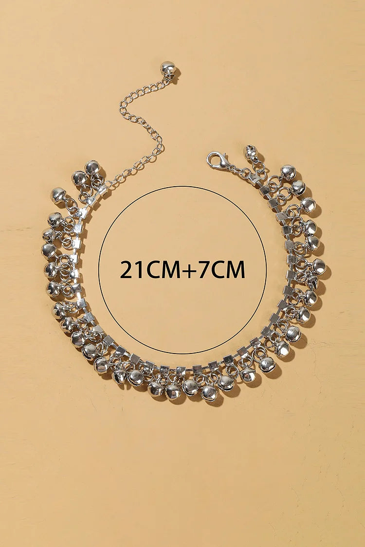 Cavigliera alla moda con frange a campana e lucentezza metallica con decorazioni in strass