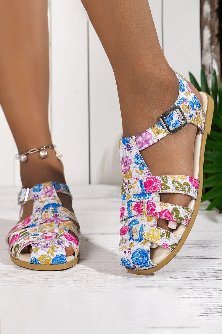 Sandalias con punta cerrada y hebilla con tiras ahuecadas con estampado floral de colores 