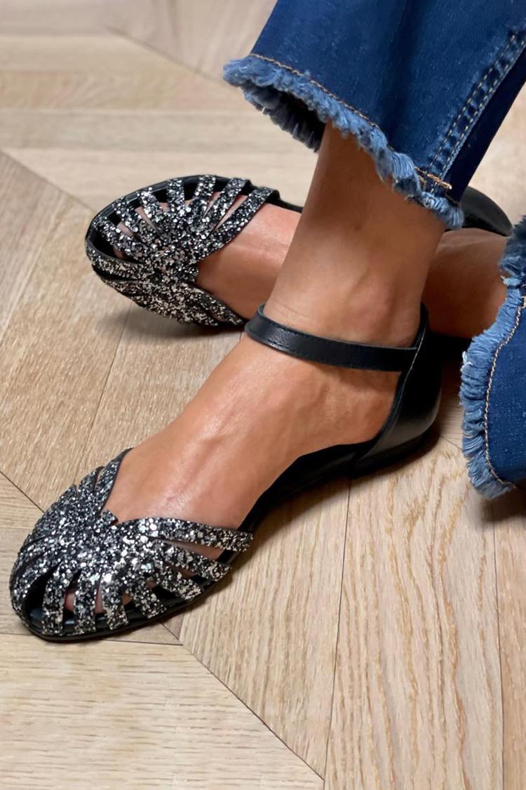 Sandali neri con cinturino alla caviglia, fibbia e punta tonda con glitter e trafori