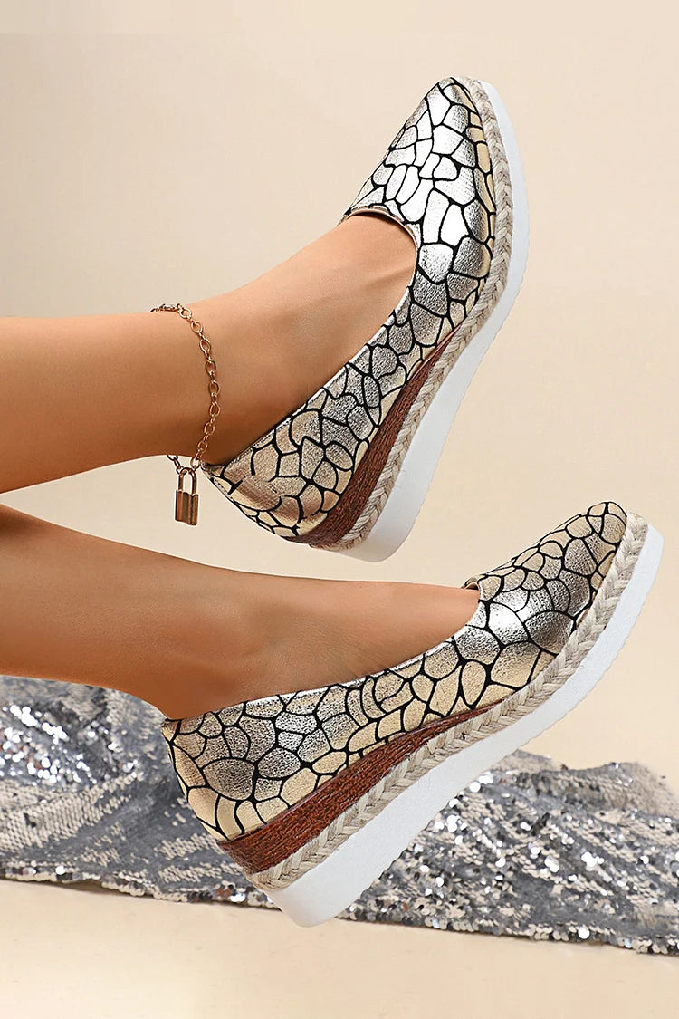 Zeppe con punta affilata e stampa animalier metallizzata