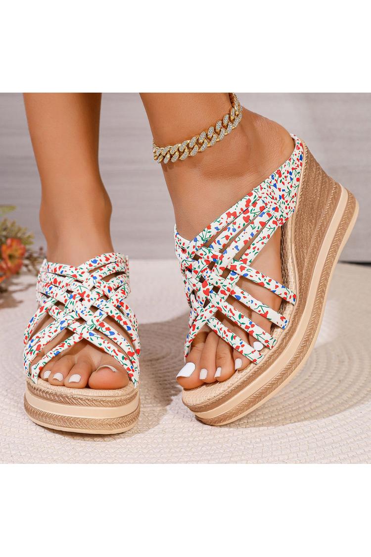 Sandalias de cuña con punta redonda, tiras tejidas y estampado floral