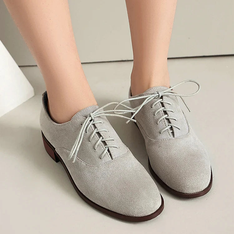 Oxfords con punta tonda, tacco basso e lacci, patchwork con stampa leopardata 