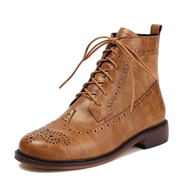 Stivaletti alla caviglia con lacci e punta tonda traforata in tinta unita