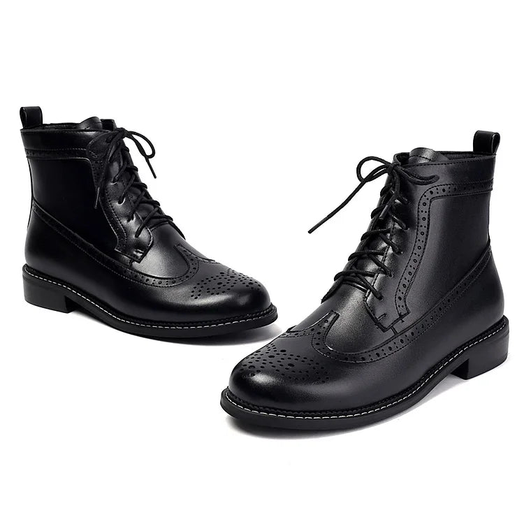 Stivaletti alla caviglia con lacci e punta tonda traforata in tinta unita