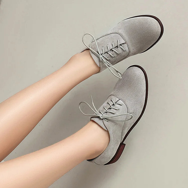 Oxfords con punta tonda, tacco basso e lacci, patchwork con stampa leopardata 