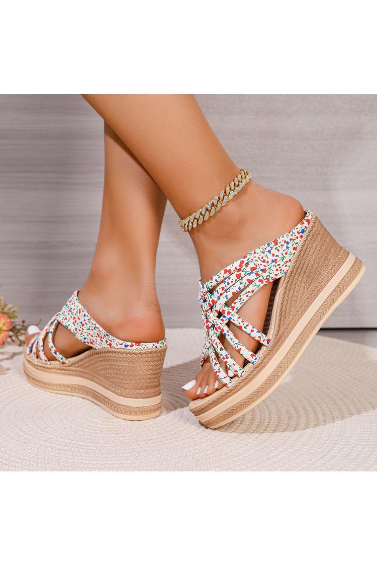 Sandalias de cuña con punta redonda, tiras tejidas y estampado floral