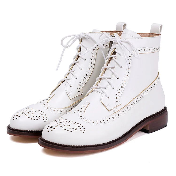 Stivaletti alla caviglia con lacci e punta tonda traforata in tinta unita