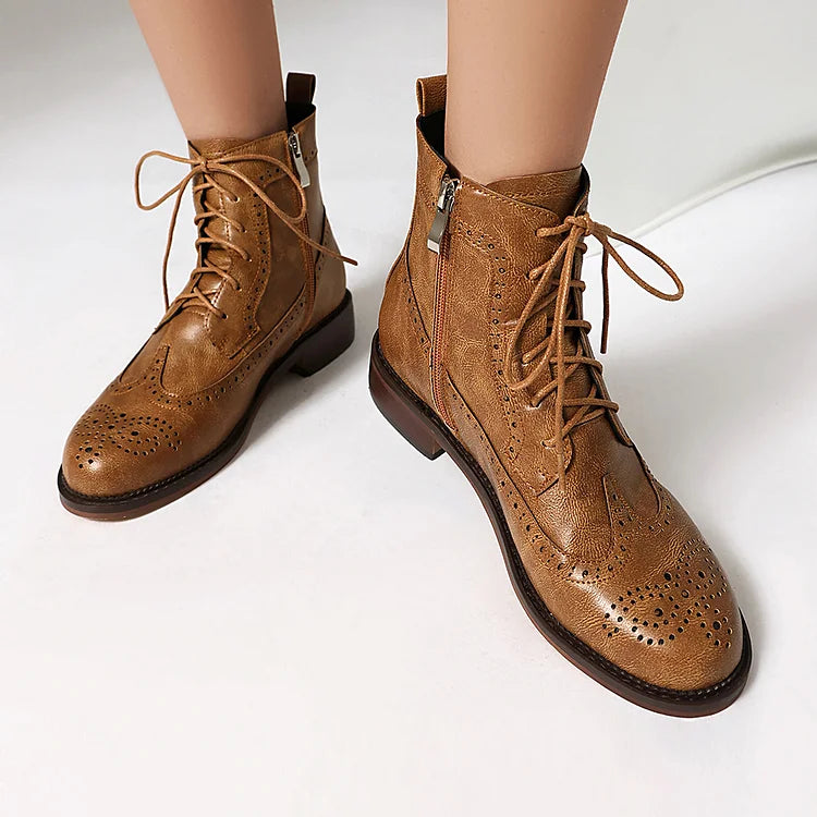 Stivaletti alla caviglia con lacci e punta tonda traforata in tinta unita