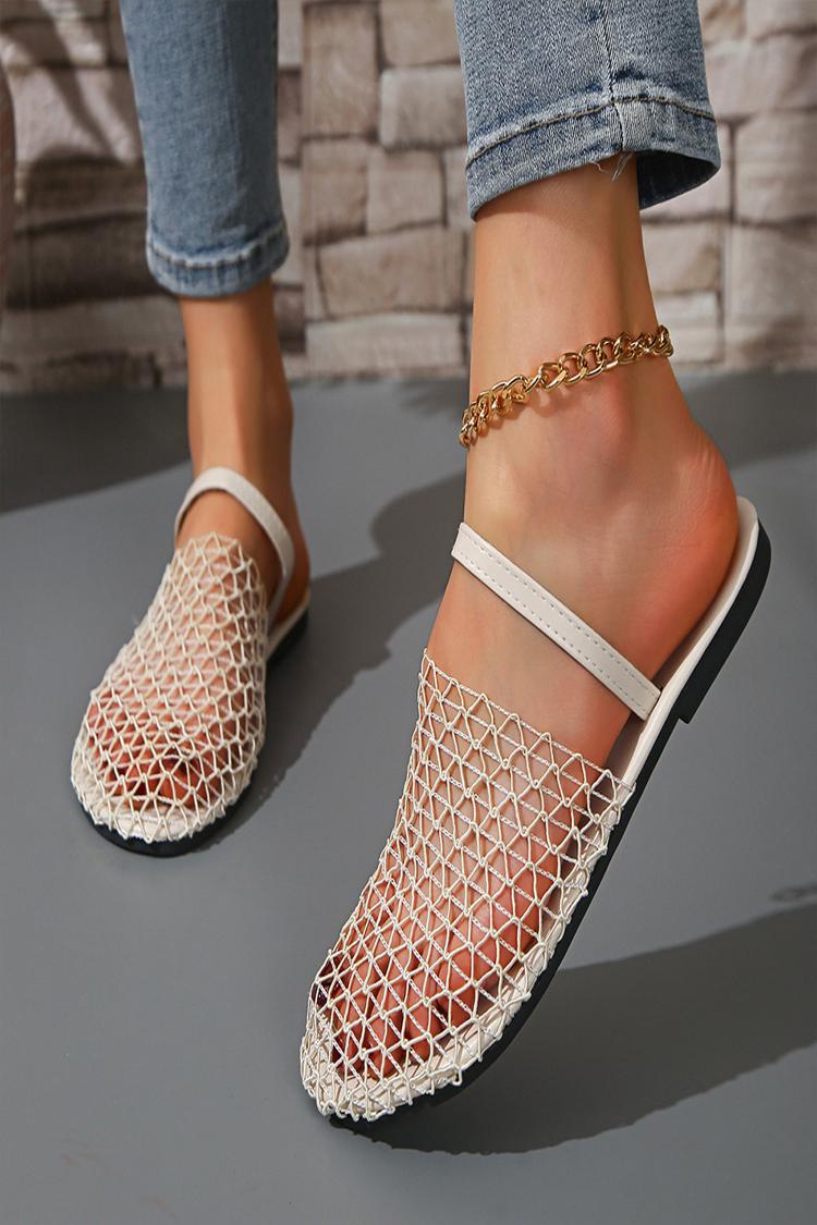 Pantofole casual con punta tonda e cinturino sul collo del piede, in tinta unita e traforate