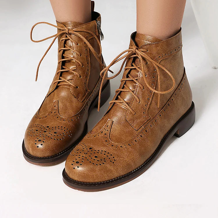 Stivaletti alla caviglia con lacci e punta tonda traforata in tinta unita