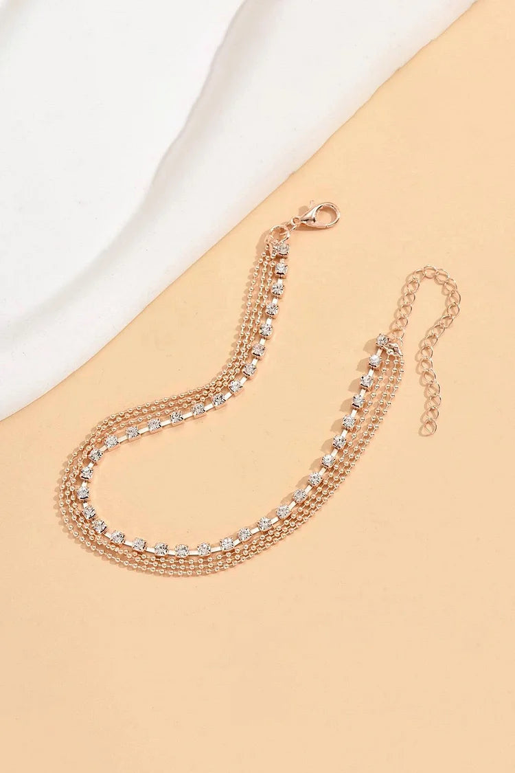 Cavigliera multistrato in lega alla moda con decorazioni in strass 