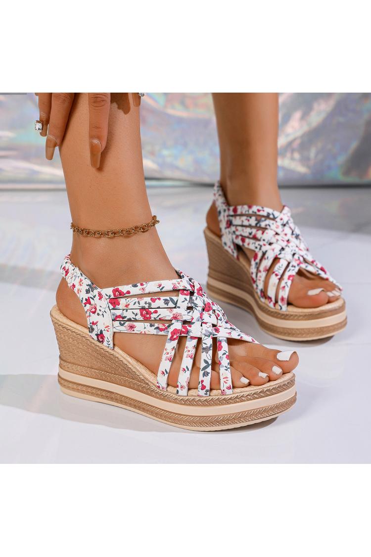 Sandalias de cuña con punta redonda, tiras tejidas y estampado floral