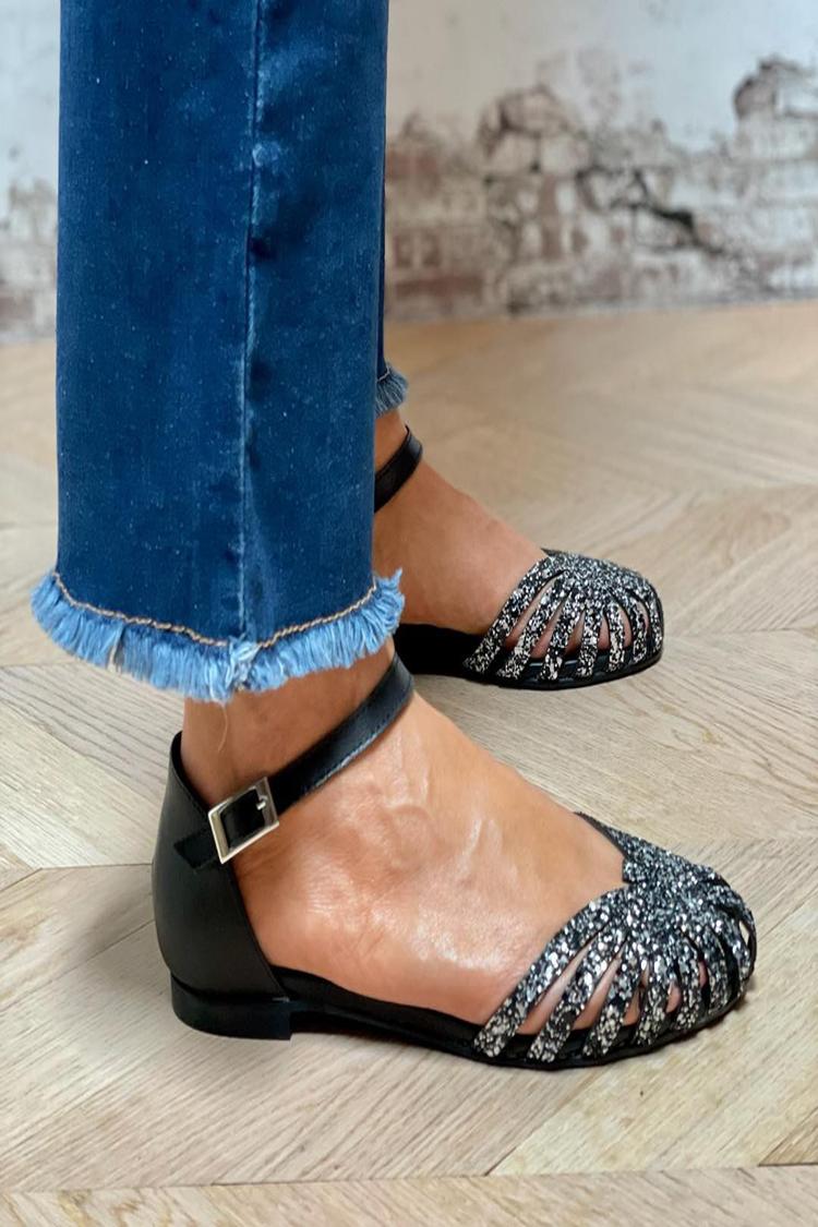 Sandali neri con cinturino alla caviglia, fibbia e punta tonda con glitter e trafori
