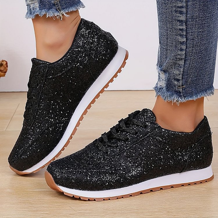 Sneakers in tinta unita con punta tonda e pizzo con paillettes glitterate