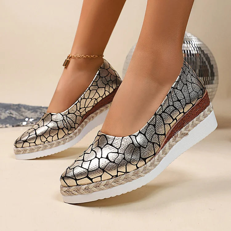 Zeppe con punta affilata e stampa animalier metallizzata