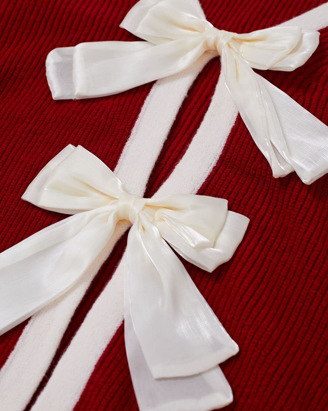 Top in maglia a contrasto con schiena scoperta e dettaglio a fiocco 