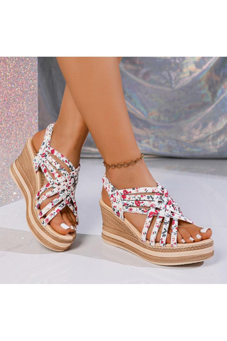 Sandalias de cuña con punta redonda, tiras tejidas y estampado floral