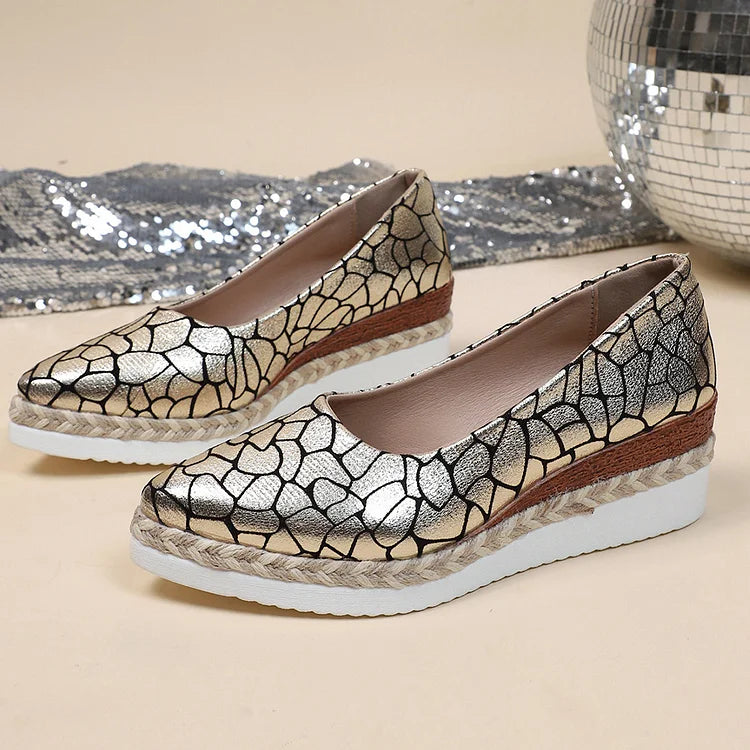 Zeppe con punta affilata e stampa animalier metallizzata