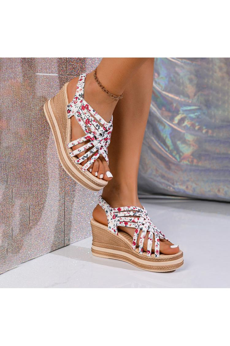 Sandalias de cuña con punta redonda, tiras tejidas y estampado floral