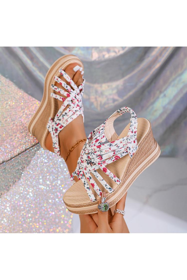Sandalias de cuña con punta redonda, tiras tejidas y estampado floral