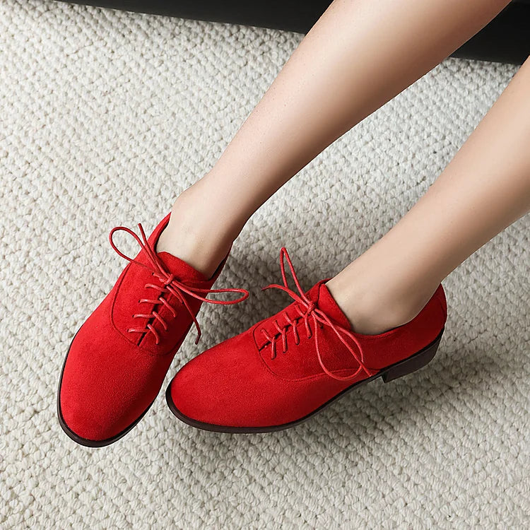 Oxfords con punta tonda, tacco basso e lacci, patchwork con stampa leopardata 