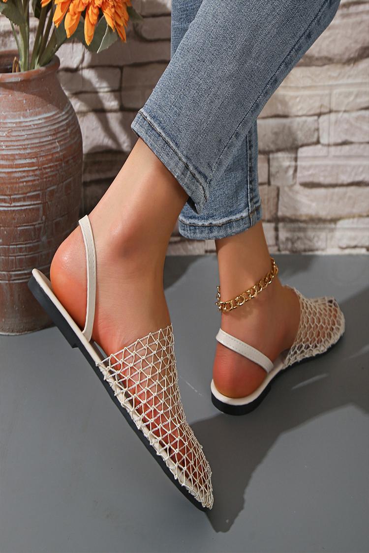 Pantofole casual con punta tonda e cinturino sul collo del piede, in tinta unita e traforate