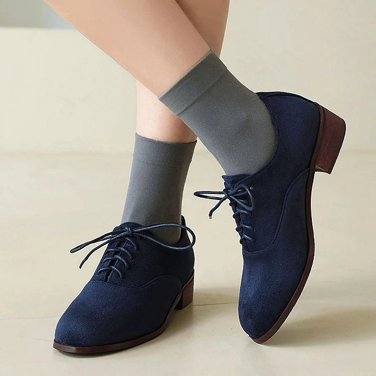 Oxfords con punta tonda, tacco basso e lacci, patchwork con stampa leopardata 