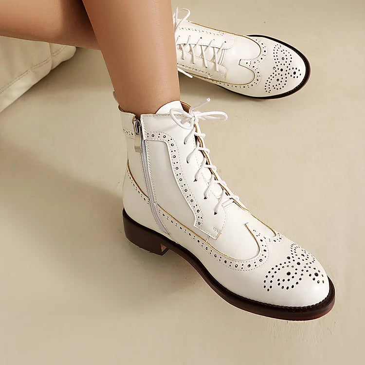 Stivaletti alla caviglia con lacci e punta tonda traforata in tinta unita